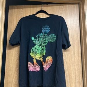 Neon colored Mickey Mouse shirt.